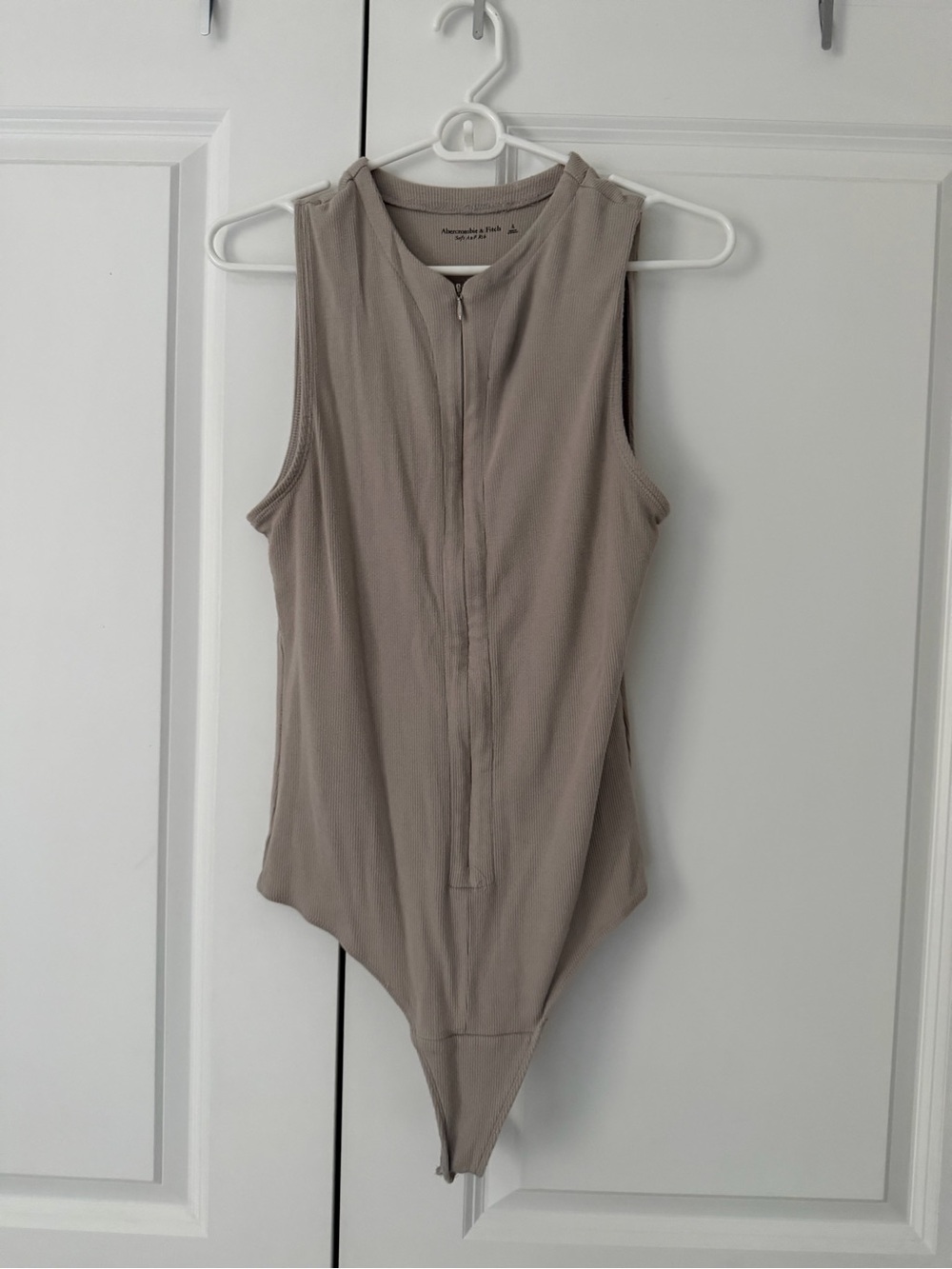 Abercrombie & Fitch Sleeveless Zip-Front Bodysuit in Taupe